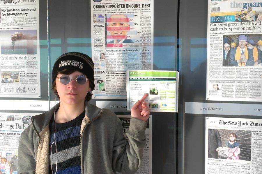 Sam+Rodd+visited+the+Newseum+and+took+a+page+of+the+Colonial+Times+so+it+could+join+the+wall+of+newspapers.
