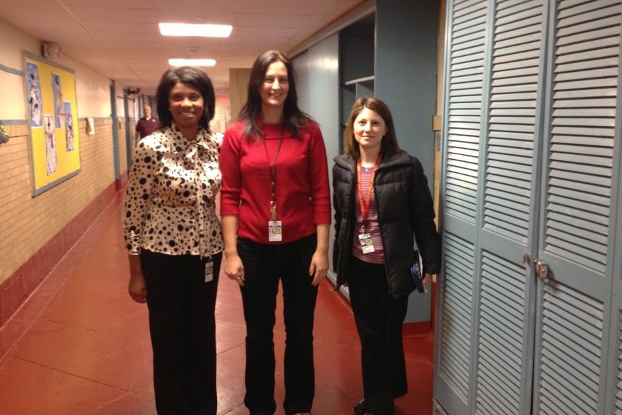 Principal Tonya Wilson (left) with teachers Meryeme Gashi and Christina Dee in the ground floor hallway.