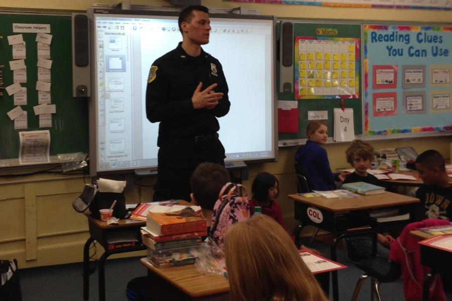 Pelham Police Officer Brian Hendrie taught the DARE class to Ms. Diana Spadaros students.