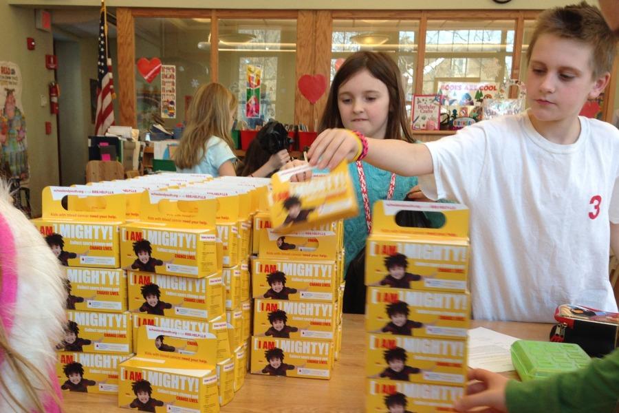 Student Government reps Honor Durham and Jacob Hartmere stacked Pennies for Patients boxes in March 2014.