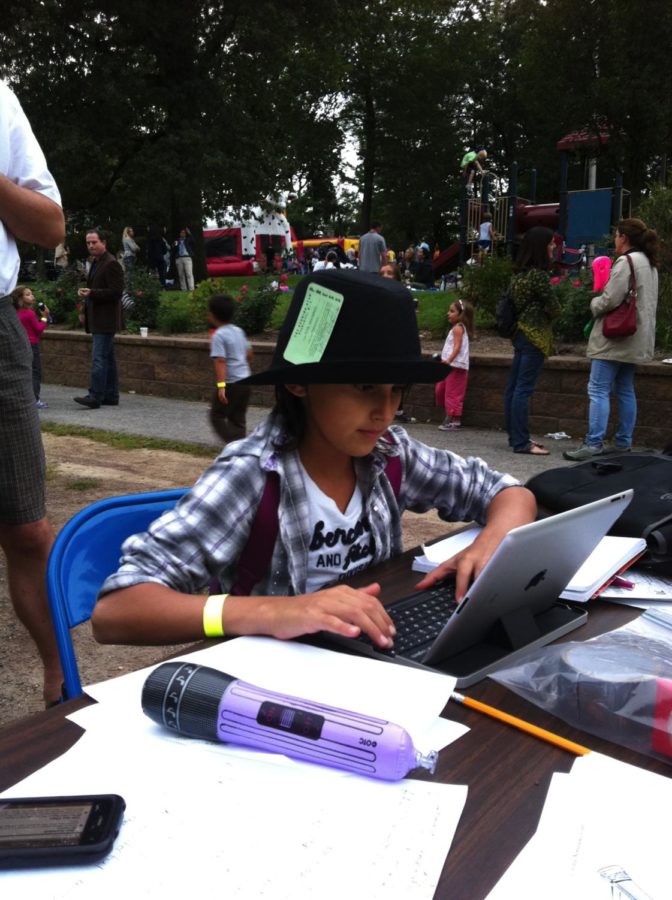 Then news editor Francesca Di Cristofano liveblogs the Colonial welcome back picnic in 2011, wearing a Westchester County Sheriff press pass (from 1982).