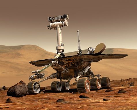 An artists concept portrays a NASA Mars Exploration Rover on the surface of Mars.
