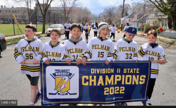 Pelham Celebrates: PMHS Hockey Team Victory with Parade